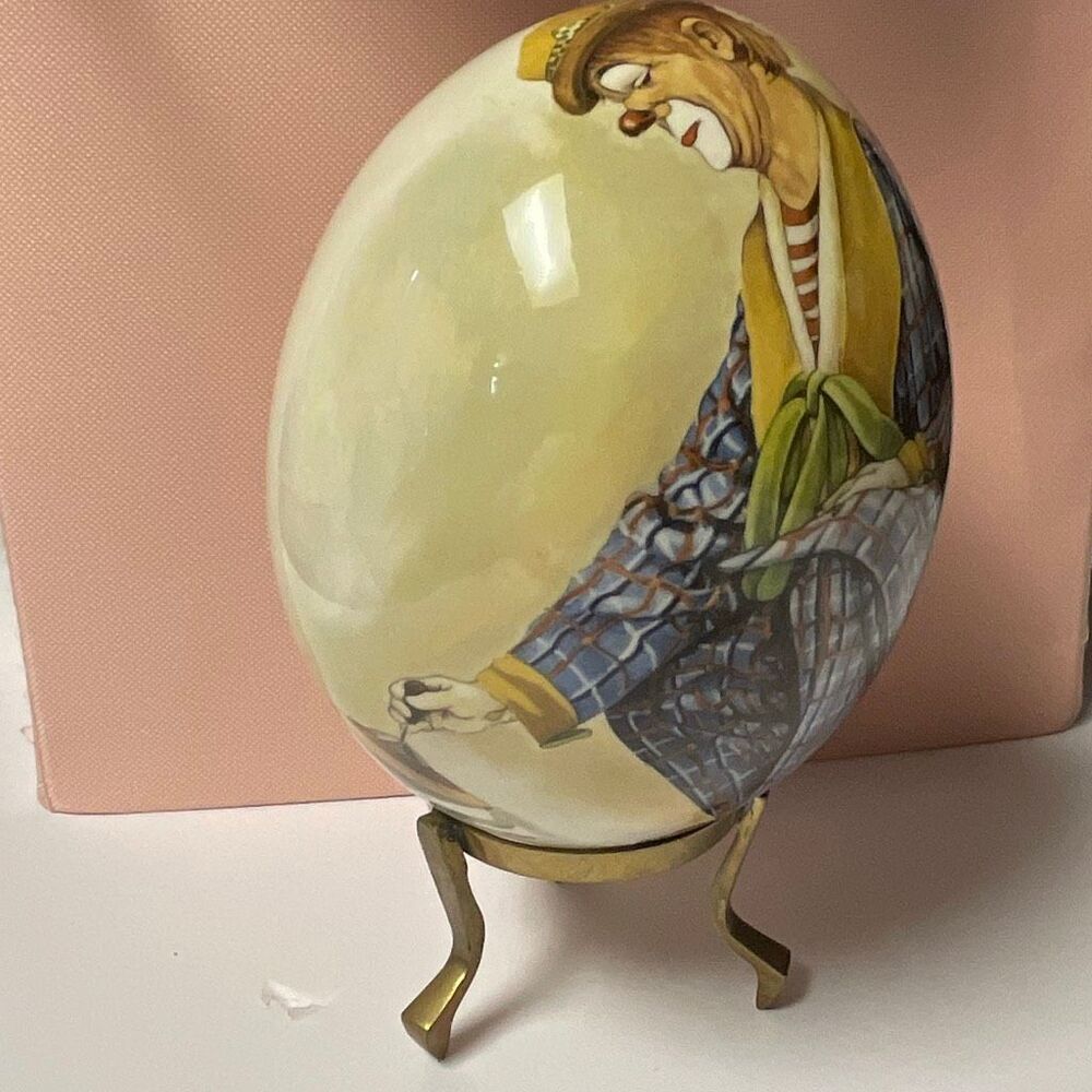 Vintage large porcelain egg. Whimsical clown spinning a top w/stand.Wausau Award